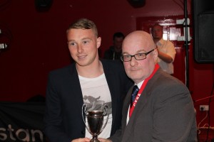 Player of the Year Nicky Adams looks a bit shellshocked after a strange bloke in a suit rings a bell in his ear....