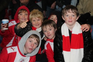 One Direction take time out of rehearsals to watch our mighty Reds.....