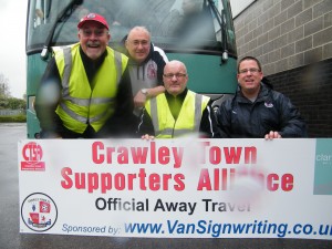 Rain or shine (mostly rain), your CTSA Travel Team stay cheerful (well, apart from the grumpy bloke in the middle.....)